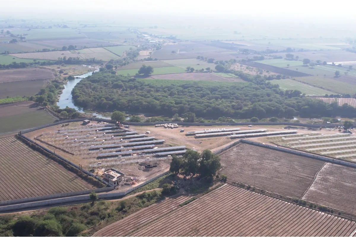 A ground-mounted solar plant among farmland